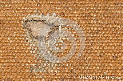 Detail (damage) of an old canvas suitcase, close-up Stock Photo