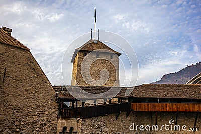 Detail of the defense walls, roofs and towers of the medieval Ca Editorial Stock Photo