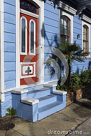 Detail of the door and facade of a colorful house in the Marigny neighbourhood in the city of New Orleans, Louisiana Stock Photo