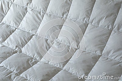 Detail of down comforter Stock Photo