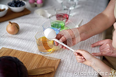 Close up of dyeing Easter eggs Stock Photo