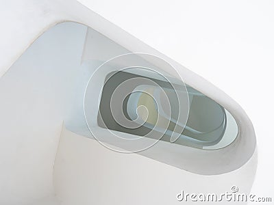Detail of empty clean white spiral staircase of Elevador de Santa Luzia elevator at Alfama old town, Portugal. High Stock Photo