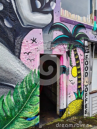 Colourful Graffiti Around Open Door Editorial Stock Photo