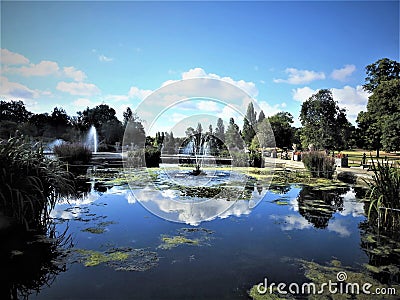 Fabulous view on chateau garden with fountains spouting water. Stock Photo