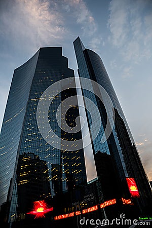 Facade of Shining Towers Abu Dhabi aginst cloudy sky Editorial Stock Photo