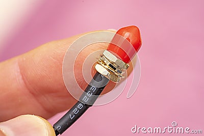 detail of female plug of SMA antenna with red protection cap used in radiocommunications Stock Photo