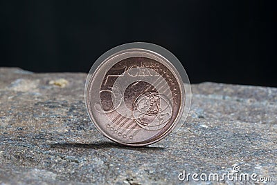 Detail five cent Euro coin, a metal that represents the economy and purchasing power. Stock Photo