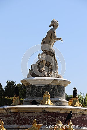 Fountain in the gardens of the Palace of Versailles Editorial Stock Photo