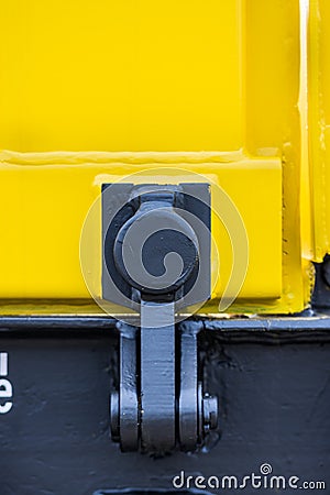 Detail- Freight cargo train - yellow black New 4-axled flat cars wagons Type:Res Model:072-2- Transvagon AD Stock Photo