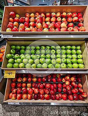 Red and Green Apple Varieties on Sale in Supermarket Editorial Stock Photo