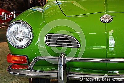 Detail of front mask and round headlights of veteran classical german coupe car Volkswagen Karmann Ghia from year 1962 Editorial Stock Photo