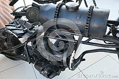 Detail of fuel tank of replica of motorbike from postapocalyptic movie Mad Max - Fury Road, made of junkyard scrap parts Editorial Stock Photo