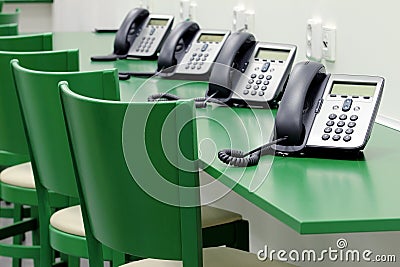 Detail of green call center with ip phones Stock Photo