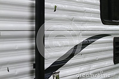Detail of hall damage on a recreational vehicle Stock Photo