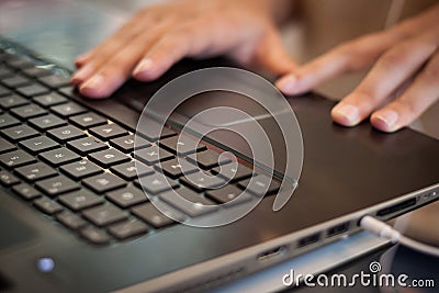 Detail of hands working on computer keyboard Stock Photo