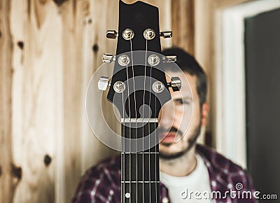 Detail of a headstock of a classical guitar. Music and guitarist Stock Photo