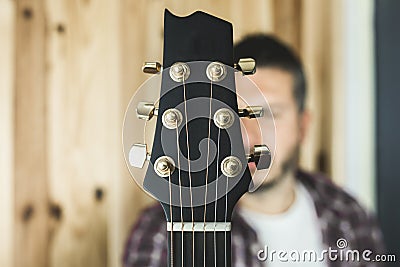 Detail of a headstock of a classical guitar. Music and guitarist Stock Photo