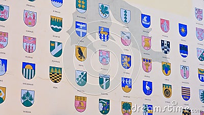 Detail of house with coats of arms of the Latvian cities in Riga Stock Photo
