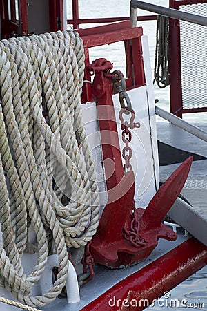 Sternwheel anchor and rope coil Stock Photo