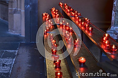 Detail of the interior: votive candles Editorial Stock Photo