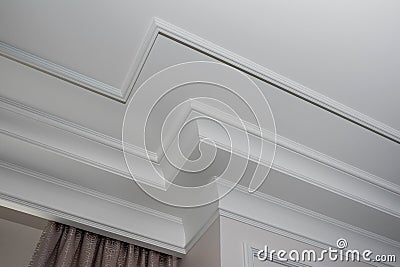 Detail of intricate corner crown molding. a detail of corner ceiling Stock Photo