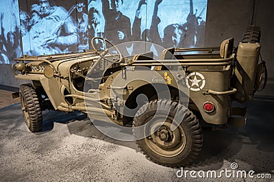 Detail of the Jeep Willys MB nicknamed "Eugene the Jeep" with the drawing of the mascot. Editorial Stock Photo