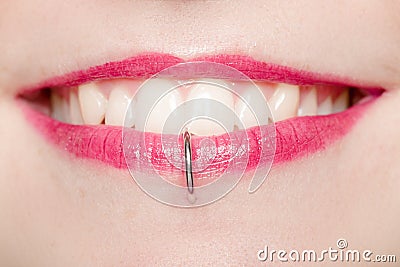 Smiling Mouth with Labret Piercing Stock Photo