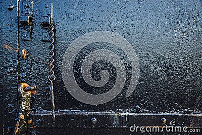 Detail of old metal door in Red Hook, Brooklyn, New York Stock Photo