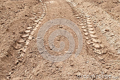 Lots tire track on dirty soil ground for abstract background Stock Photo
