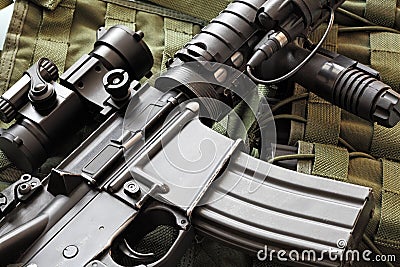 Detail of M4A1 (AR-15) carbine and tactical vest Stock Photo