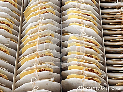 Detail of Many Tea Bags in a Box Stock Photo