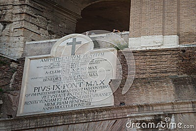 Detail on marble plaque l outside Colosseum in Rome placed by Pope Benedict XIV pope referring to and to dedicated to Christian Editorial Stock Photo