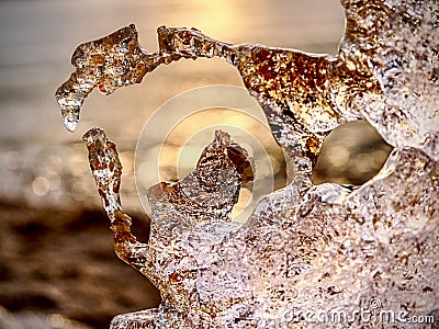 Detail of melting ice block floating in the river. Frozen river surface Stock Photo