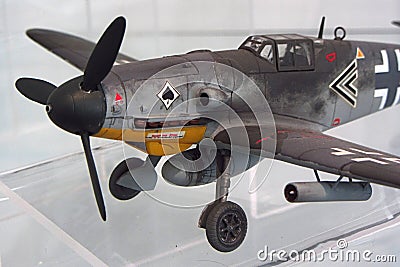 Detail of model of Nazi German fighter aircraft Messerschmitt Bf-109G equipped with rockets and drop fuel tank Editorial Stock Photo