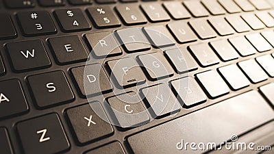 Detail of a Modern Laptop`s Flat Keyboard, Necessary Part of Computer for Entering Input Information Stock Photo