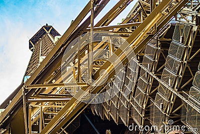 Numerous stairs bringing sporty tourists up and down the Eiffel tower in Paris. Stock Photo