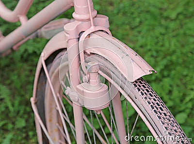 Detail of old bicycle with the bottle dynamo device for the head Stock Photo