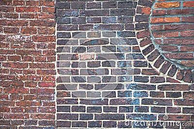 Detail from an old brick wall with different patterns visible Stock Photo