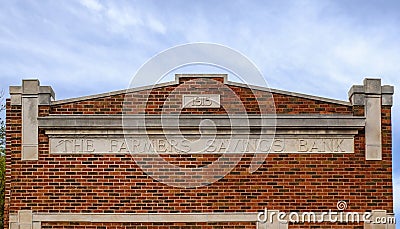 A former state bank with a sign The Farmers Savings Bank in Brandon, Iowa, United States. Editorial Stock Photo