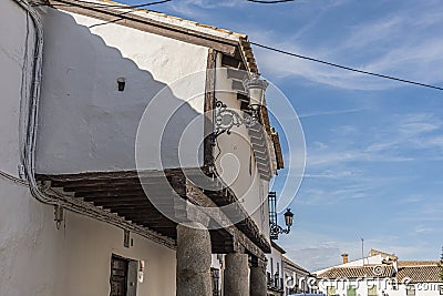 Detail of old construction with gallery columns and lanterns in the city of Orgaz. Toledo province. Community of Castilla la Stock Photo