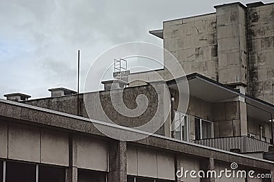 Detail of old grey concrete apartment buildings in the city of Antwerp Editorial Stock Photo