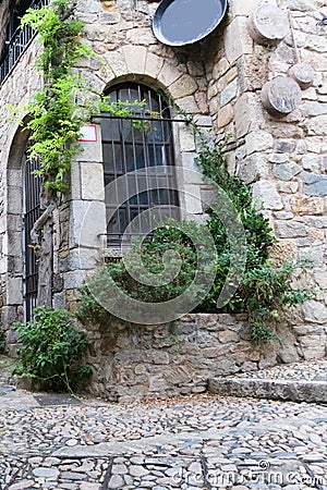 Detail of an old house in a medieval fortress in Tossa de Mar, Spain. Stock Photo