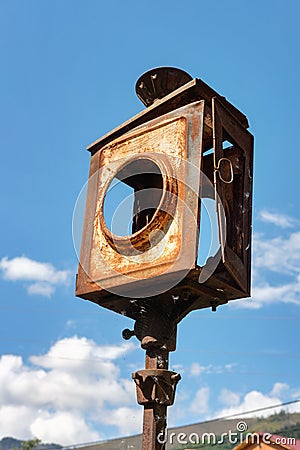 Detail of the old rusty broken semaphore signal light Stock Photo
