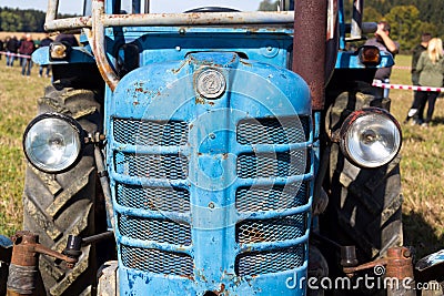 Detail of old vintage veteran tractor Zetor from former Czechoslovakia stands on field Editorial Stock Photo