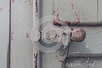 Detail old wooden door Lock vintage painted, timeworn paint Stock Photo