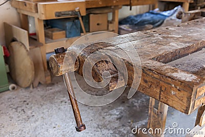 Ancient workbench in a workshop Stock Photo