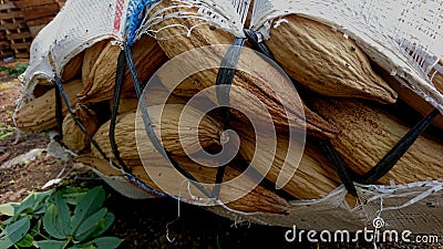 Detail pile of kapok in a sack on the ground Stock Photo