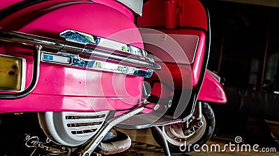 Detail of pink scooter with chromed metallic fender Editorial Stock Photo