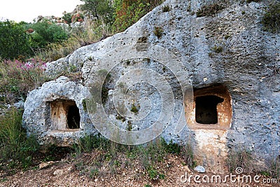 Detail of prehistoric tombs in the necropolis of Pantalica Stock Photo