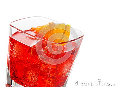 Detail of red cocktail with orange slice isolated on white background Stock Photo